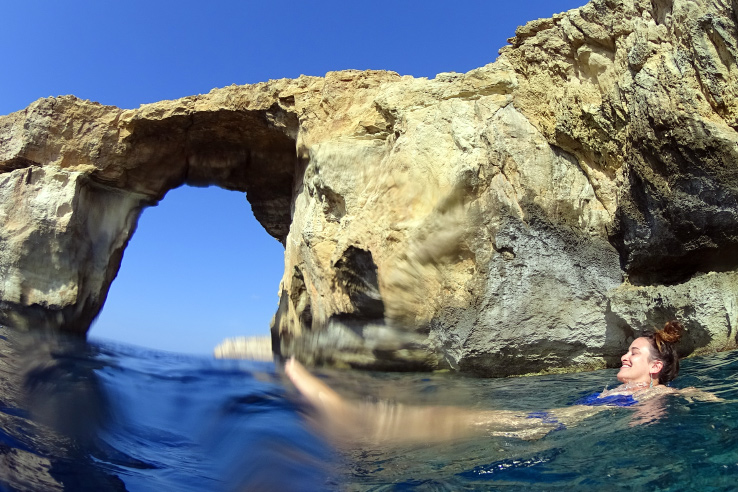 Surviving Europe: In Memory of the Azure Window in Gozo Malta - Girl Erin Swimming Under Window